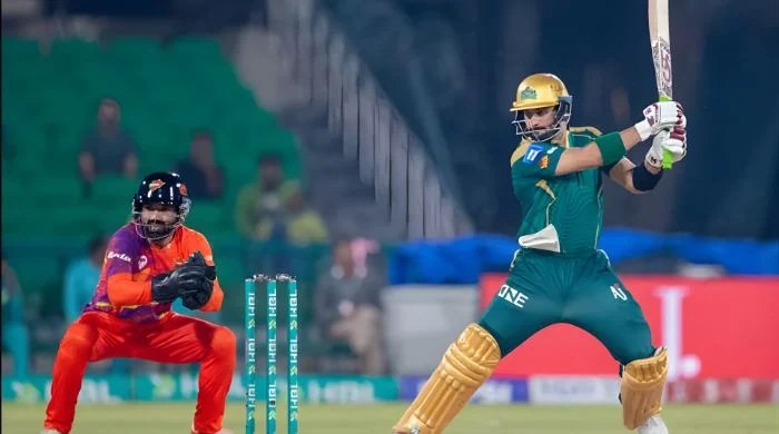 Sahibzada Farhan batting with Mohammad Rizwan behind the stumps