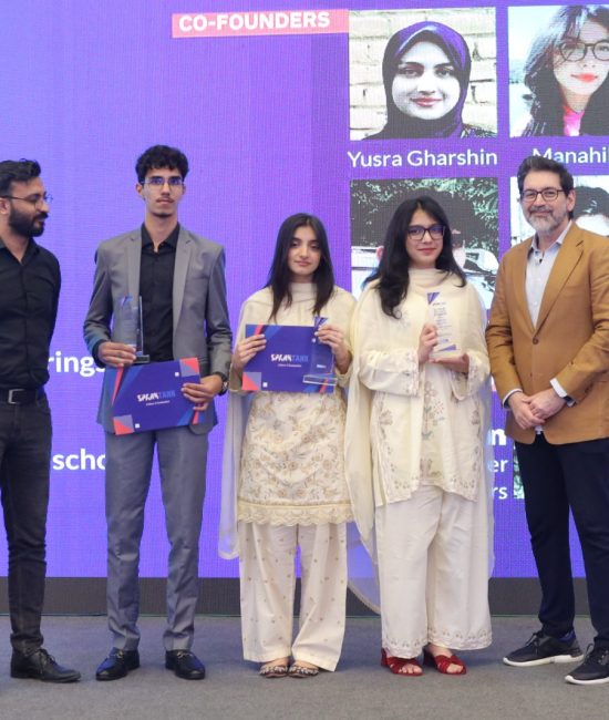 Students receiving certificates and recognition at the SparkTank Cohort 3 graduation ceremony in Lahore, showcasing young entrepreneurs alongside mentors and Beaconhouse leadership during the startup showcase event.