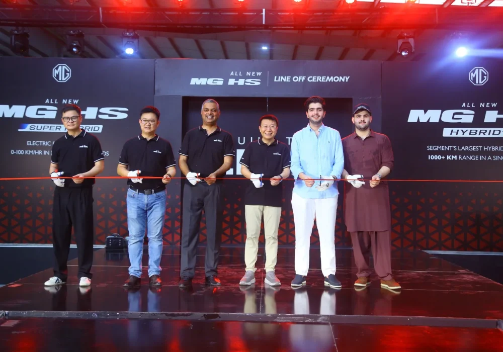 MG Pakistan officials holding a ribbon-cutting ceremony for the CKD line-off of the All New MG HS Hybrid+ and Super Hybrid vehicles.