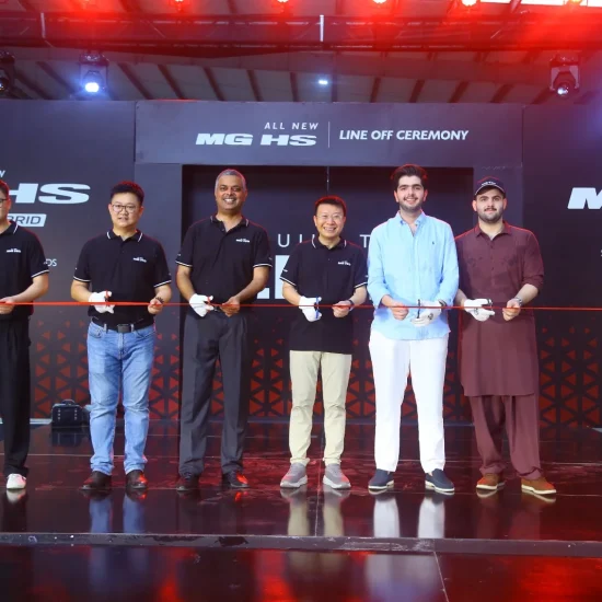 MG Pakistan officials holding a ribbon-cutting ceremony for the CKD line-off of the All New MG HS Hybrid+ and Super Hybrid vehicles.