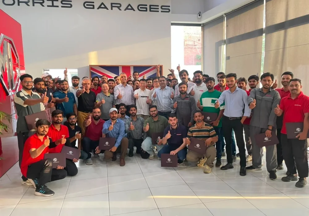 MG Motor Pakistan dealership technicians receiving hands-on hybrid vehicle battery training as part of nationwide after-sales readiness for MG HS Hybrid+ and MG HS Super Hybrid.