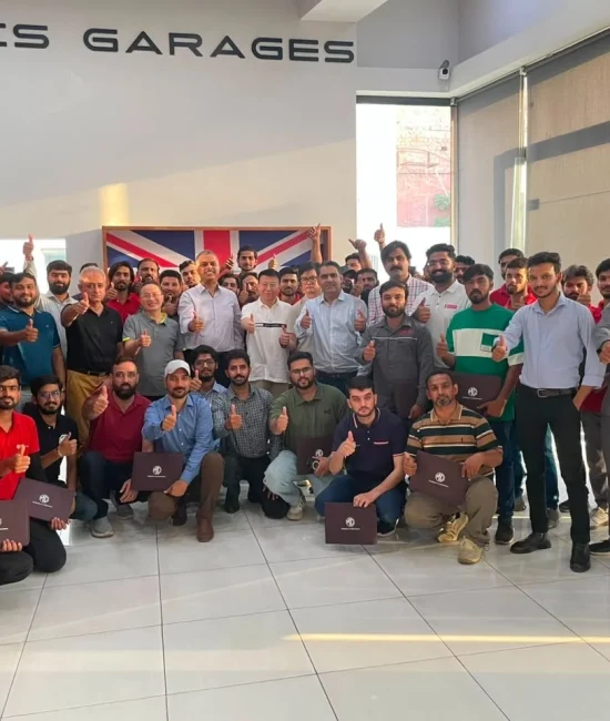 MG Motor Pakistan dealership technicians receiving hands-on hybrid vehicle battery training as part of nationwide after-sales readiness for MG HS Hybrid+ and MG HS Super Hybrid.