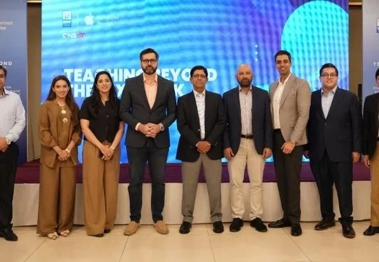 DWP Technologies and GNEXT representatives at the Teaching Beyond the Textbook event in Lahore, promoting digital learning, Apple technology and modern education solutions in Pakistan.